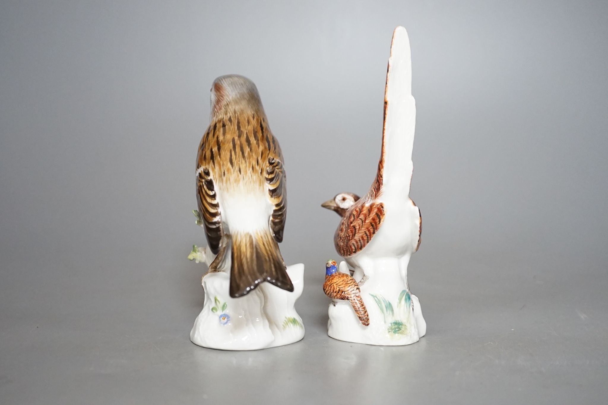 A Meissen porcelain pheasant and sparrow, incised numbers to base, 15cm